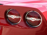 Click Here For Full Product Info E21645 DISCONTINUED Light Cover-Tail Lights-Polished Executive Style-With C6 Emblems-4 Pieces-05-13