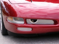 E21462 GRILLE-FRONT FOG LIGHT-PERFORATED-POLISHED-STAINLESS STEEL-1 pair-97-04